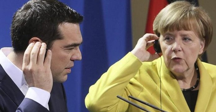 Tsipras y Merkel durante su encuentro del lunes