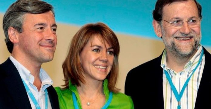 Cospedal, entre Acebes y Rajoy