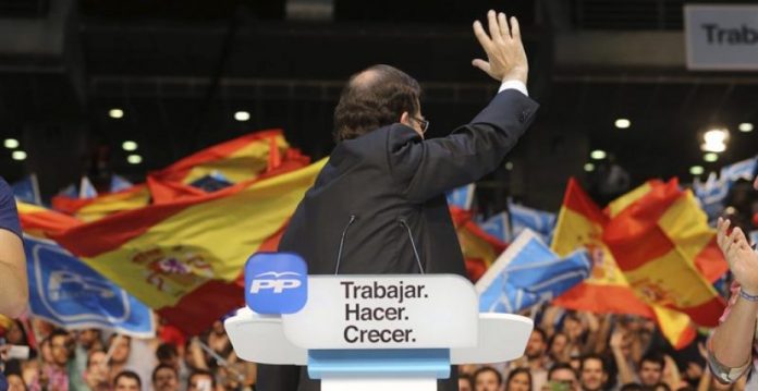 Rajoy de espaldas