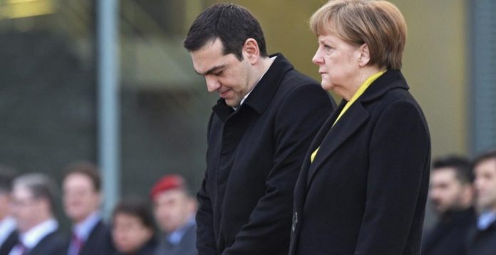 Tsipras y Merkel durante un encuentro